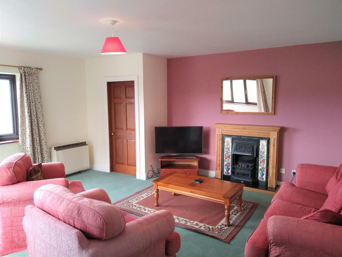 Tyddyn Crwn Country-House Apartments Beaumaris Bagian luar foto